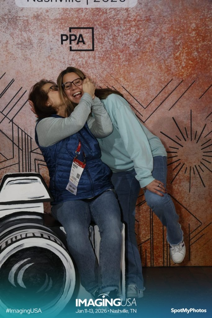 This author having fun with her photographer friend at a national conference.